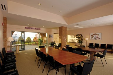Meeting room with wooden tables