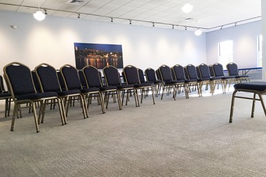 Meeting room with rows of chairs